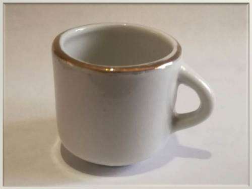 Miniature porcelain cup with gilt finishing