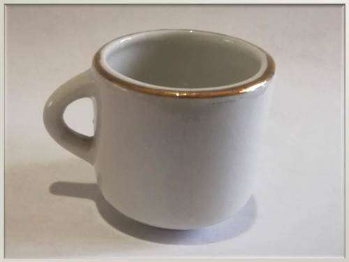 Miniature porcelain cup with gilt finishing