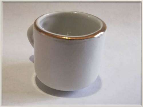 Miniature porcelain cup with gilt finishing