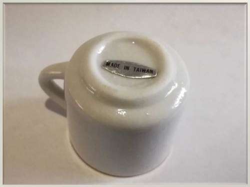 Miniature porcelain cup with gilt finishing