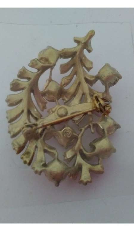 Gold tone and pink stone  brooch