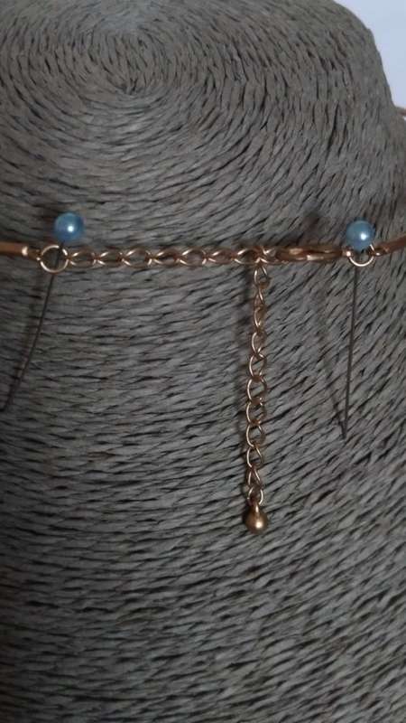 Gold tone round necklace