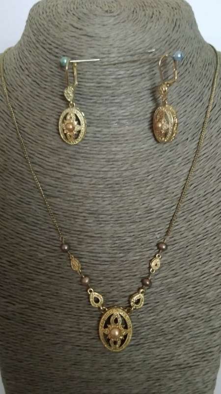 2 Piece -  Gold tone necklace and earnings