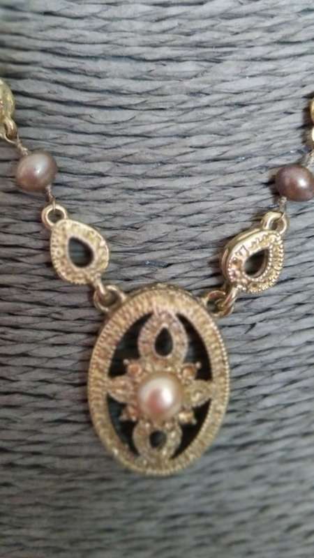 2 Piece -  Gold tone necklace and earnings