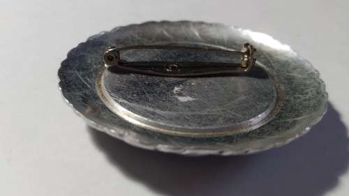Blue & silver tone brooch