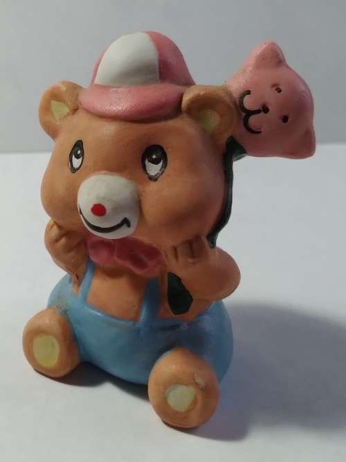 Miniature teddy and bear