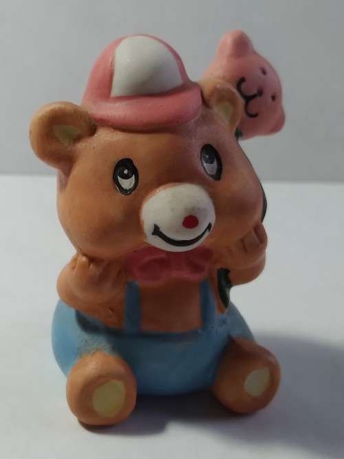 Miniature teddy and bear