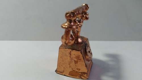 Miniature copper old style telephone