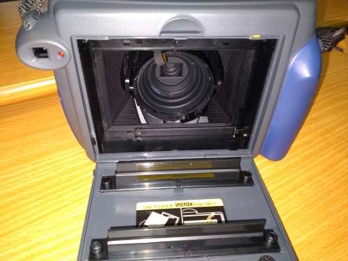 Fujifilm Instax 200 Instant Camera - To repair or for parts, battery compartment damaged