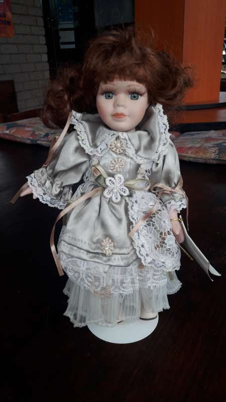 The Kailee Collection Porcelain doll