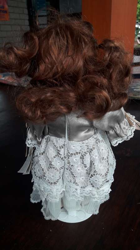 The Kailee Collection Porcelain doll
