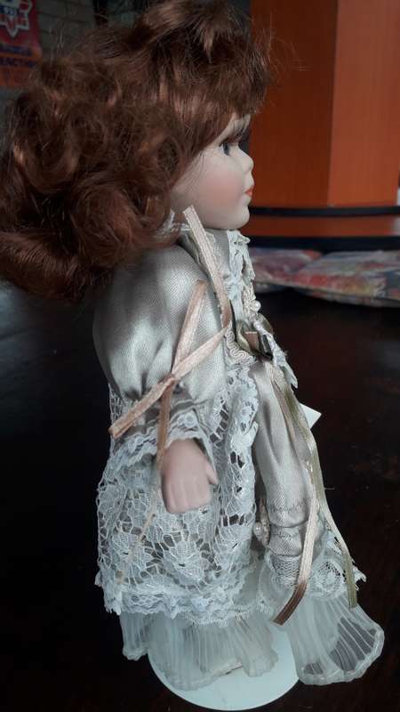 The Kailee Collection Porcelain doll