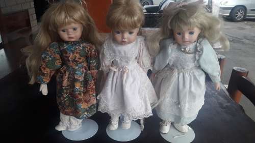 Three Little Girls Porcelain Dolls