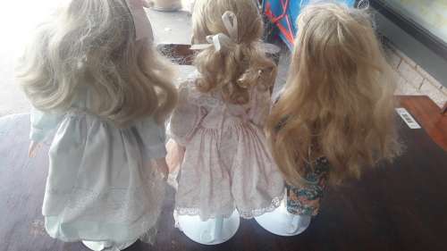 Three Little Girls Porcelain Dolls