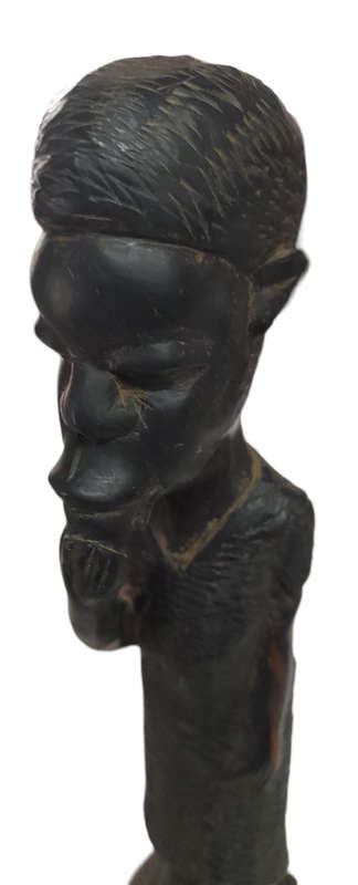 Vintage Handcrafted Man Putting Something In His Mouth
