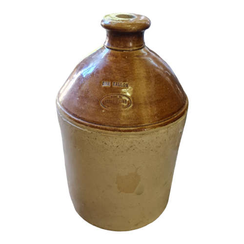 Three vintage one gallon stoneware `Vereeniging` ginger beer jars.