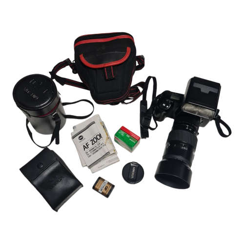 Minolta Dynax 5000i film camera combo, including two lenses and bags.