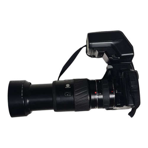 Minolta Dynax 5000i film camera combo, including two lenses and bags.