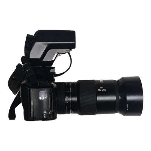 Minolta Dynax 5000i film camera combo, including two lenses and bags.