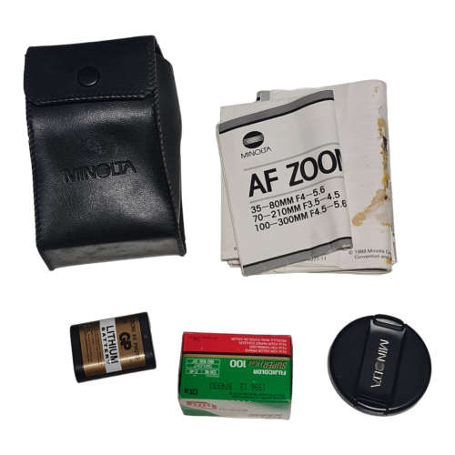 Minolta Dynax 5000i film camera combo, including two lenses and bags.