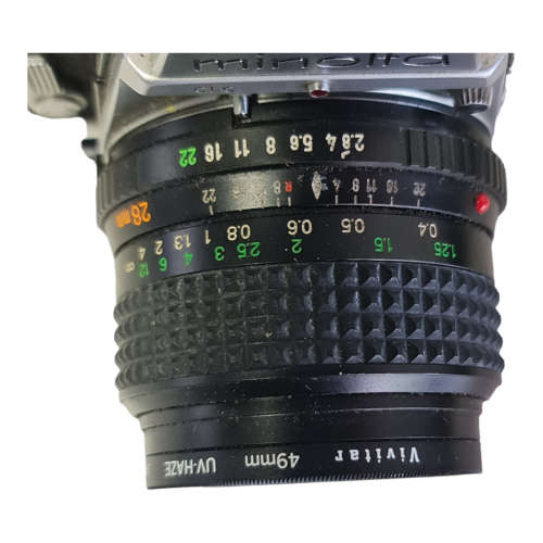 Minolta SRT101b film camera, including lenses, bags, etc as a combo