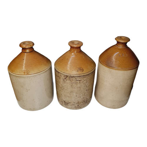 Two vintage one gallon stoneware `Vereeniging` ginger beer jars.