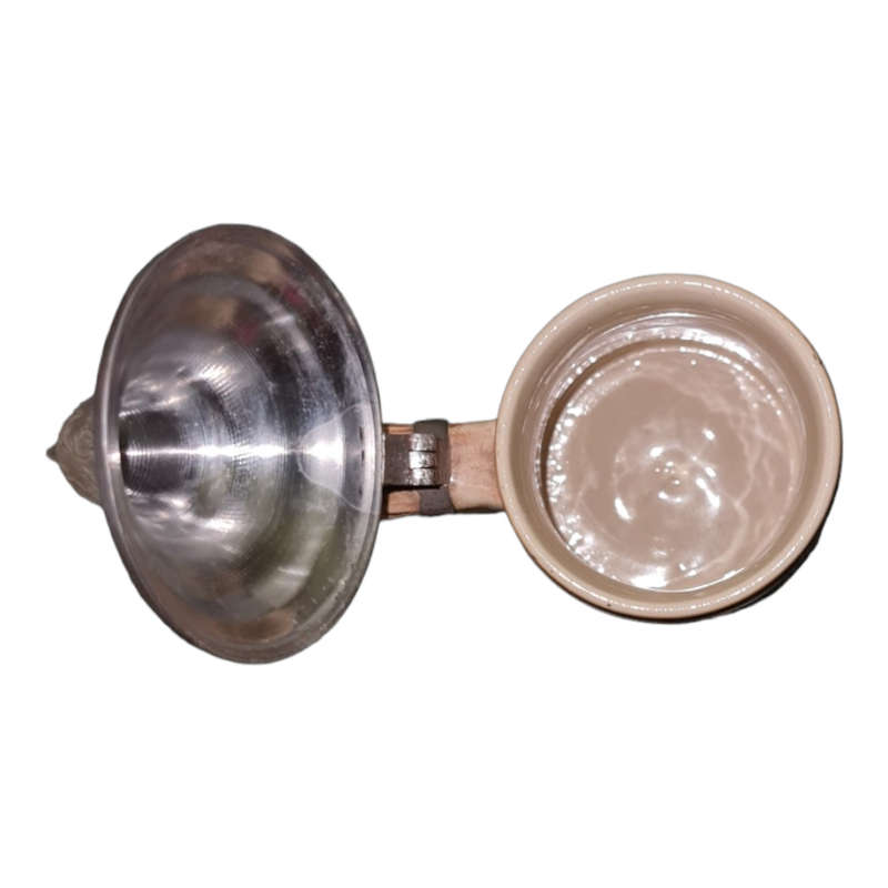 Vintage German ceramic beer mug with a hinged pewter lid.