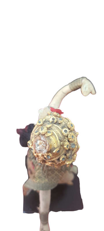 T. Thai Doll