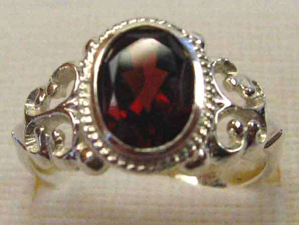 Lovely ,Sterling Silver and Genuine Garnet Ring.