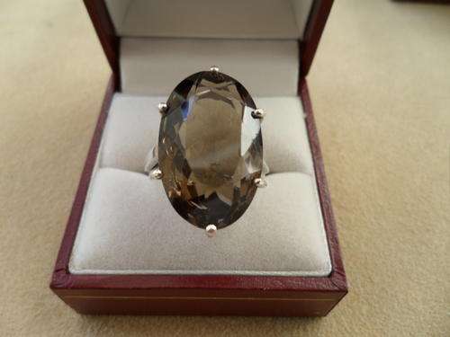 STERLING SILVER RING SET WITH ENOURMOUS 100% NATURAL SMOKEY TOPAZ.