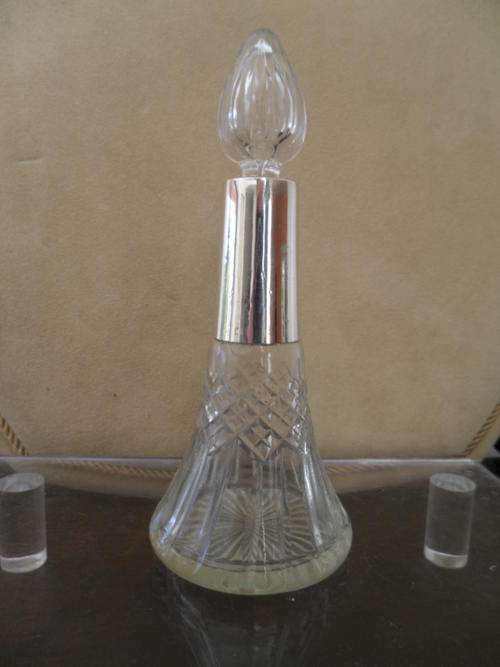 ANTIQUE STERLING (HALLMARKED) SILVER CUT CRYSTAL PERFUME BOTTLE.