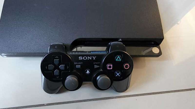 CFW, PS3 Slimline (500GB Internal Drive), 1 Controller, All Cabling, 15 Games on the HDD