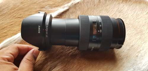 Sony SAL16105 16-105mm f/3.5-5.6 Wide-Range Zoom Lens with Rear Cap & Lens Hood