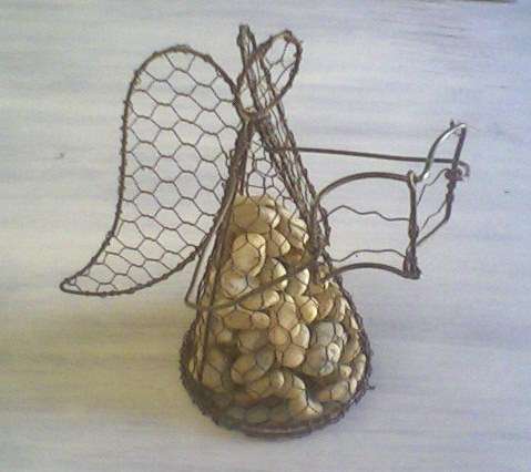 Beautiful Angel filled with river stones, use as doorstopper to welcome your guests this Christmas!