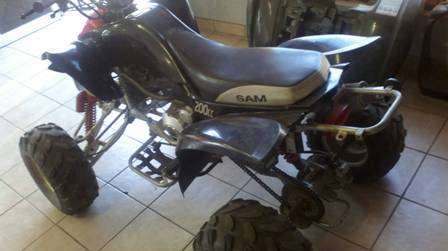 Sam 4spd Quad Bike with full face helmet