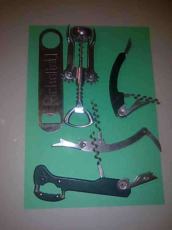 5 vintage bottle openers