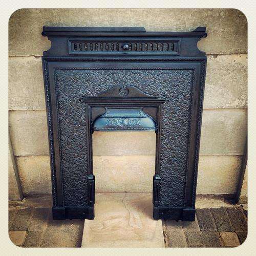 An Antique Victorian Era Cast Iron Fire Place Door Frame / Surround.
