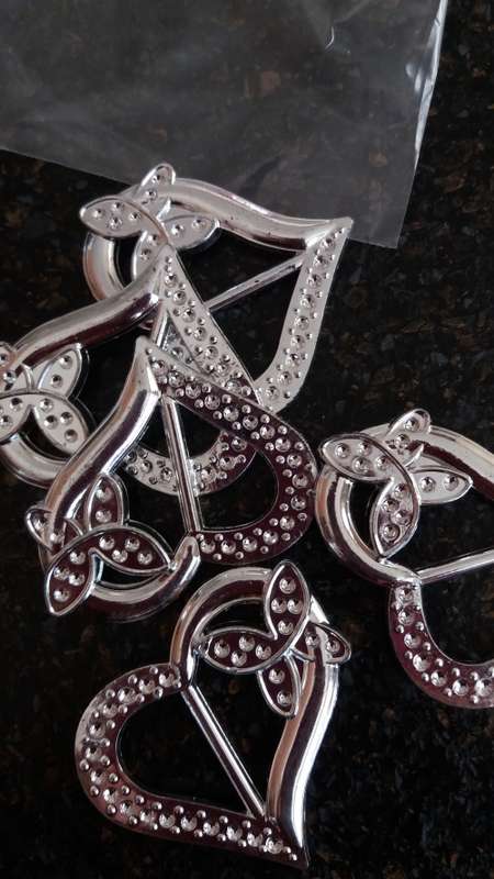 60mm heart serviette rings  with butterfly. 5 per packet. Bid per packet