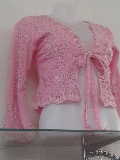 pink short ribbon and lace jacket with tie front.  Size 32