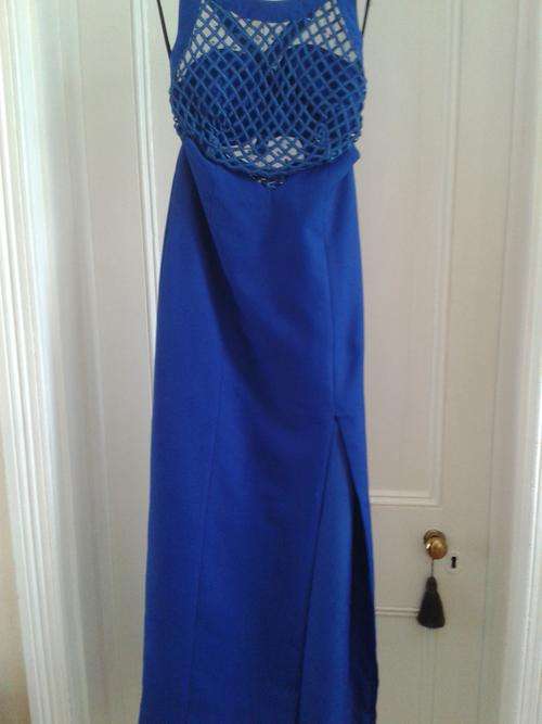 Midnight blue evening dress with open back and slits