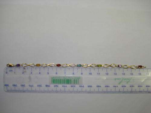 Solid 9ct gold diamond and gemstone bracelet