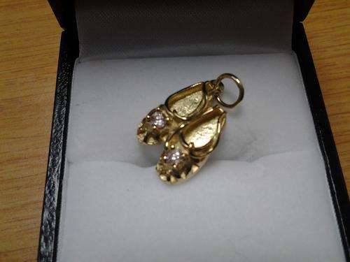 Solid 9ct Gold charm or pendant with pink stones