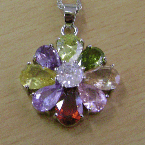 STUNNING MULTI COLOUR SIMULATED FLOWER PENDENT