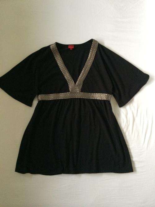 VERY HOT LADIES BLOUSE WITH LOW CUT NECKLINE AND BRONZE LEATERETTE DETAIL