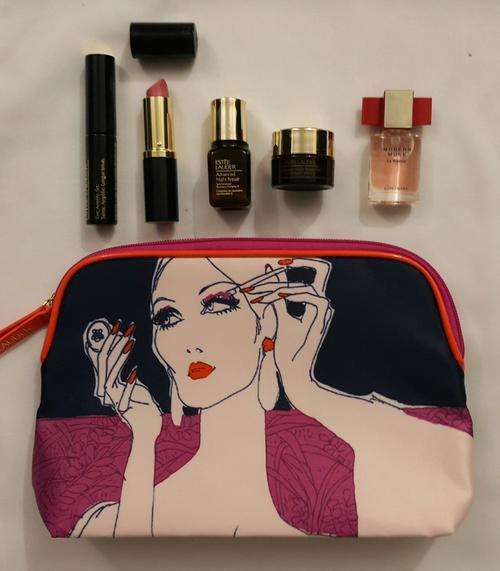 Estee Lauder / R870.00 value Travel size products and Make up Purse