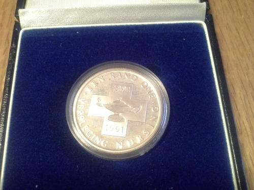 1991 SILVER R1 NURSING COIN slight toning