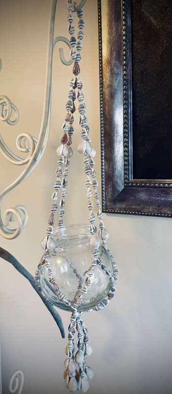 Macramé sea shell plant hanger or I used ot as a candle holder