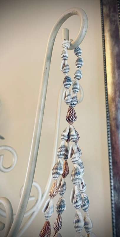 Macramé sea shell plant hanger or I used ot as a candle holder