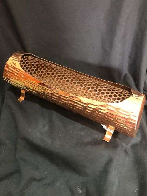 Vase coppered log