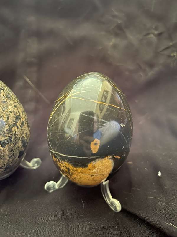 Ornaments marble eggs stands